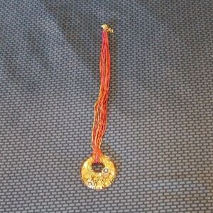 Elegant Gold and Red Pendant Necklace